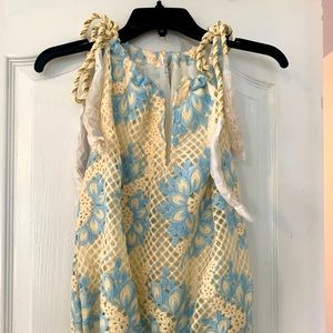 New sleeveless crochet shirt with tie shoulders